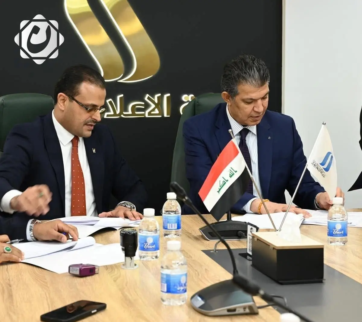 توقيع عقد بين شبكة الإعلام والمفوضية العليا للانتخابات لطباعة سجل الناخبين