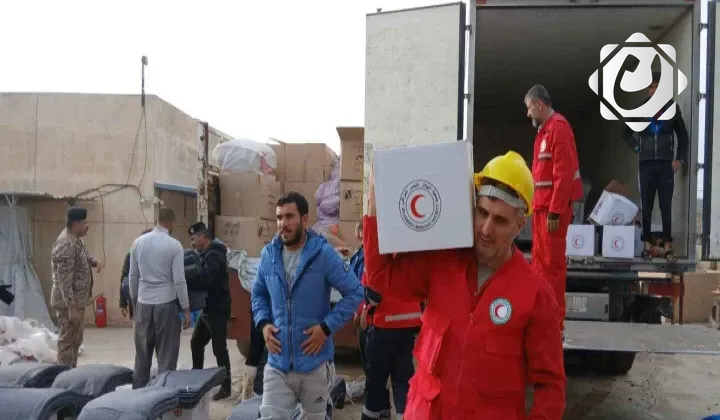 جمعية الهلال الأحمر العراقي توزع مساعدات عاجلة للمتضررين من السيول